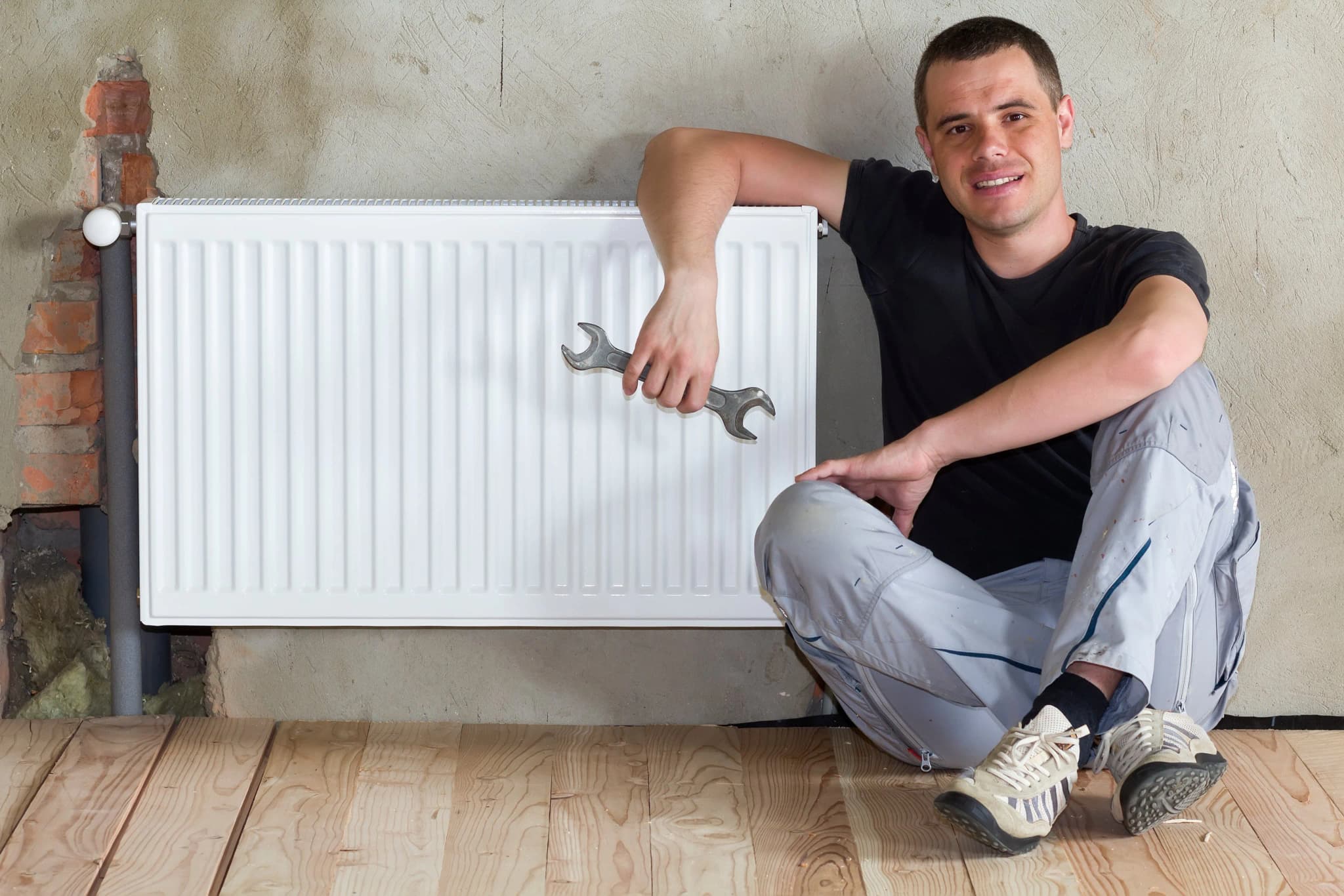 Professional central heating installation in progress